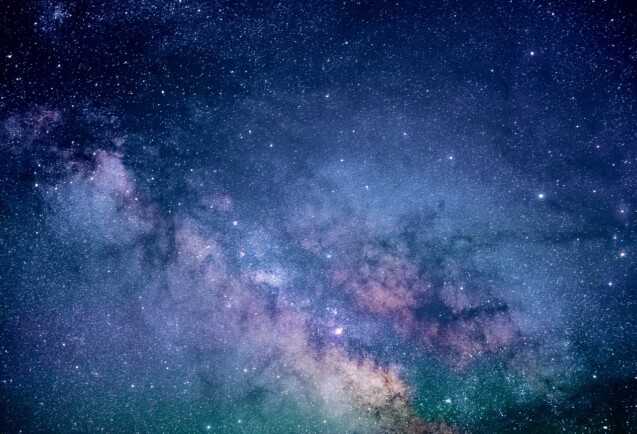 a galaxy of stars in blues and purples